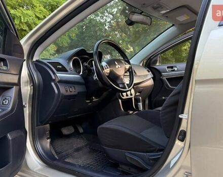 Бежевий Міцубісі Lancer, об'ємом двигуна 2 л та пробігом 132 тис. км за 7500 $, фото 12 на Automoto.ua