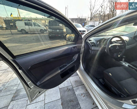 Бежевий Міцубісі Lancer, об'ємом двигуна 2 л та пробігом 250 тис. км за 8400 $, фото 14 на Automoto.ua