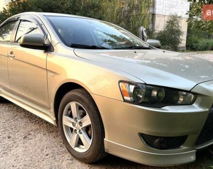 Бежевий Міцубісі Lancer, об'ємом двигуна 2 л та пробігом 132 тис. км за 7500 $, фото 2 на Automoto.ua
