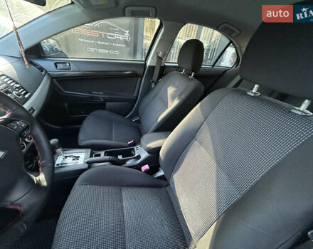 Бежевий Міцубісі Lancer, об'ємом двигуна 2 л та пробігом 250 тис. км за 8400 $, фото 16 на Automoto.ua
