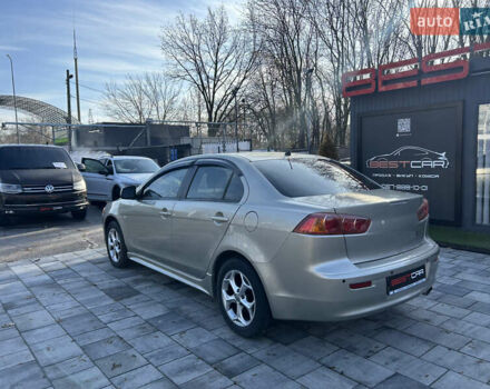 Бежевий Міцубісі Lancer, об'ємом двигуна 2 л та пробігом 250 тис. км за 8400 $, фото 13 на Automoto.ua