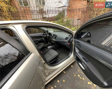 Бежевий Міцубісі Lancer, об'ємом двигуна 2 л та пробігом 240 тис. км за 6300 $, фото 7 на Automoto.ua