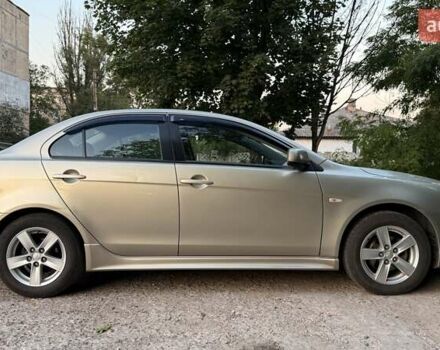 Бежевий Міцубісі Lancer, об'ємом двигуна 2 л та пробігом 132 тис. км за 7500 $, фото 5 на Automoto.ua