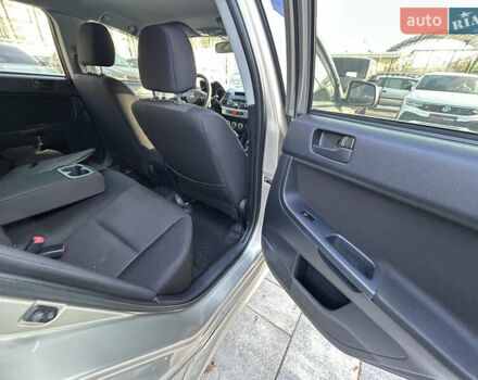 Бежевий Міцубісі Lancer, об'ємом двигуна 2 л та пробігом 250 тис. км за 8400 $, фото 24 на Automoto.ua