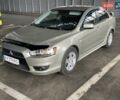 Бежевий Міцубісі Lancer, об'ємом двигуна 2 л та пробігом 190 тис. км за 6100 $, фото 1 на Automoto.ua