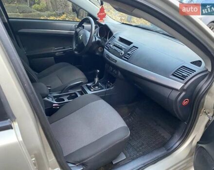 Бежевый Мицубиси Лансер, объемом двигателя 1.5 л и пробегом 242 тыс. км за 5999 $, фото 21 на Automoto.ua