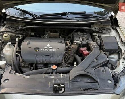 Бежевий Міцубісі Lancer, об'ємом двигуна 2 л та пробігом 132 тис. км за 7500 $, фото 19 на Automoto.ua