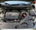 Бежевий Міцубісі Lancer, об'ємом двигуна 2 л та пробігом 132 тис. км за 7500 $, фото 19 на Automoto.ua
