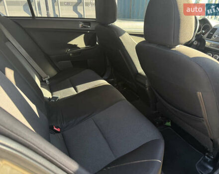 Бежевый Мицубиси Лансер, объемом двигателя 2 л и пробегом 238 тыс. км за 5500 $, фото 12 на Automoto.ua