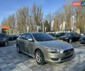Бежевий Міцубісі Lancer, об'ємом двигуна 2 л та пробігом 250 тис. км за 8400 $, фото 7 на Automoto.ua