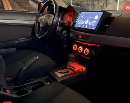 Бежевий Міцубісі Lancer, об'ємом двигуна 2 л та пробігом 132 тис. км за 7500 $, фото 27 на Automoto.ua