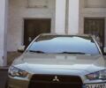 Бежевий Міцубісі Lancer, об'ємом двигуна 2 л та пробігом 220 тис. км за 7900 $, фото 1 на Automoto.ua