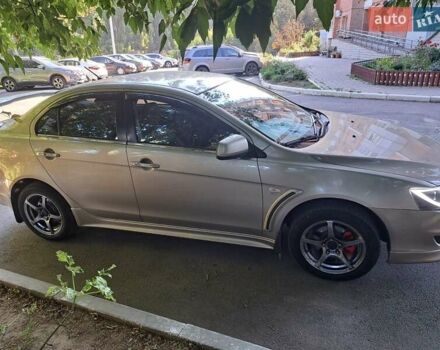 Бежевый Мицубиси Лансер, объемом двигателя 2 л и пробегом 142 тыс. км за 6300 $, фото 5 на Automoto.ua