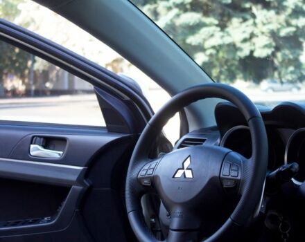 Бежевий Міцубісі Lancer, об'ємом двигуна 2 л та пробігом 220 тис. км за 7900 $, фото 9 на Automoto.ua