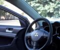 Бежевий Міцубісі Lancer, об'ємом двигуна 2 л та пробігом 220 тис. км за 7900 $, фото 9 на Automoto.ua