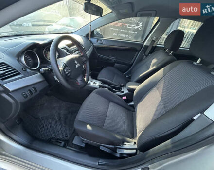 Бежевий Міцубісі Lancer, об'ємом двигуна 2 л та пробігом 250 тис. км за 8400 $, фото 15 на Automoto.ua