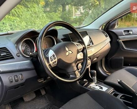 Бежевий Міцубісі Lancer, об'ємом двигуна 2 л та пробігом 132 тис. км за 7500 $, фото 13 на Automoto.ua