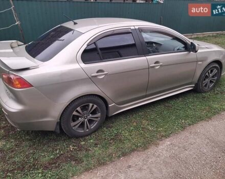 Бежевий Міцубісі Lancer, об'ємом двигуна 2 л та пробігом 160 тис. км за 7500 $, фото 2 на Automoto.ua