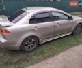 Бежевий Міцубісі Lancer, об'ємом двигуна 2 л та пробігом 160 тис. км за 7500 $, фото 2 на Automoto.ua