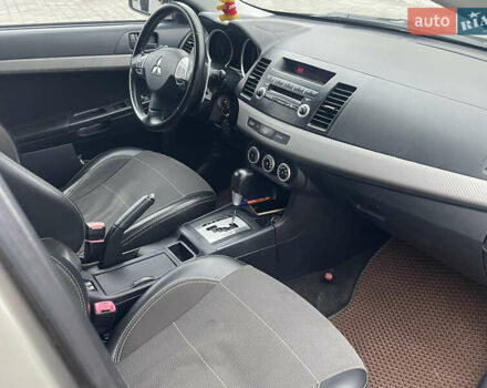 Бежевый Мицубиси Лансер, объемом двигателя 2 л и пробегом 230 тыс. км за 5599 $, фото 7 на Automoto.ua