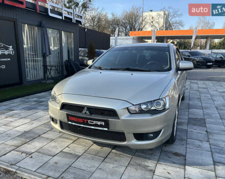 Бежевий Міцубісі Lancer, об'ємом двигуна 2 л та пробігом 250 тис. км за 8400 $, фото 4 на Automoto.ua