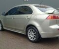 Бежевий Міцубісі Lancer, об'ємом двигуна 2 л та пробігом 200 тис. км за 6500 $, фото 6 на Automoto.ua