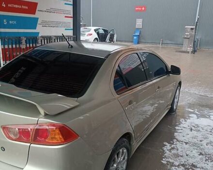 Бежевий Міцубісі Lancer, об'ємом двигуна 2 л та пробігом 200 тис. км за 6500 $, фото 11 на Automoto.ua