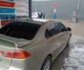 Бежевий Міцубісі Lancer, об'ємом двигуна 2 л та пробігом 200 тис. км за 6500 $, фото 11 на Automoto.ua