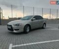 Бежевый Мицубиси Лансер, объемом двигателя 2 л и пробегом 240 тыс. км за 6200 $, фото 1 на Automoto.ua