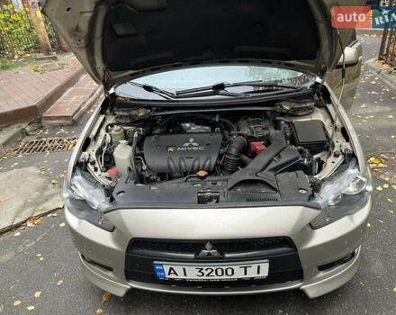 Бежевий Міцубісі Lancer, об'ємом двигуна 2 л та пробігом 240 тис. км за 6300 $, фото 9 на Automoto.ua