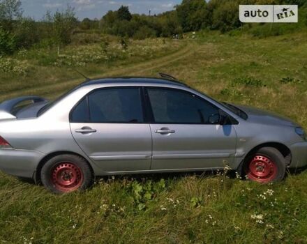Бежевий Міцубісі Lancer, об'ємом двигуна 1.6 л та пробігом 200 тис. км за 3700 $, фото 9 на Automoto.ua