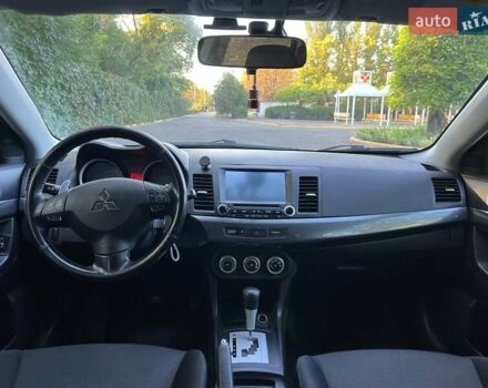 Бежевый Мицубиси Лансер, объемом двигателя 2 л и пробегом 146 тыс. км за 7750 $, фото 9 на Automoto.ua