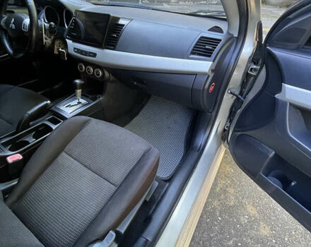 Бежевий Міцубісі Lancer, об'ємом двигуна 2 л та пробігом 189 тис. км за 6500 $, фото 19 на Automoto.ua