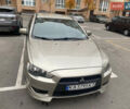 Бежевий Міцубісі Lancer, об'ємом двигуна 2 л та пробігом 173 тис. км за 7500 $, фото 1 на Automoto.ua