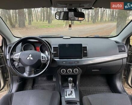 Бежевий Міцубісі Lancer, об'ємом двигуна 2 л та пробігом 262 тис. км за 6500 $, фото 7 на Automoto.ua