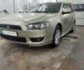 Бежевий Міцубісі Lancer, об'ємом двигуна 2 л та пробігом 202 тис. км за 7500 $, фото 5 на Automoto.ua