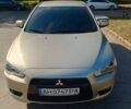 Бежевий Міцубісі Lancer, об'ємом двигуна 2 л та пробігом 50 тис. км за 9000 $, фото 1 на Automoto.ua