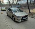 Бежевий Міцубісі Lancer, об'ємом двигуна 2 л та пробігом 65 тис. км за 10000 $, фото 1 на Automoto.ua