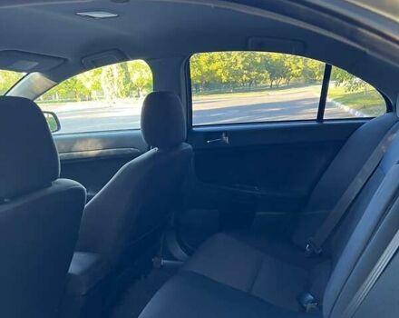 Бежевый Мицубиси Лансер, объемом двигателя 2 л и пробегом 146 тыс. км за 7750 $, фото 10 на Automoto.ua