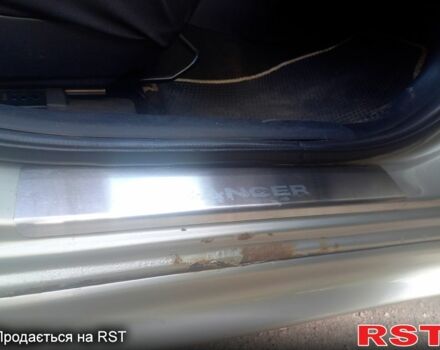 Бежевий Міцубісі Lancer, об'ємом двигуна 2 л та пробігом 209 тис. км за 7400 $, фото 7 на Automoto.ua