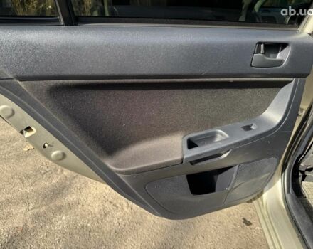 Бежевий Міцубісі Lancer, об'ємом двигуна 1.5 л та пробігом 217 тис. км за 5690 $, фото 12 на Automoto.ua