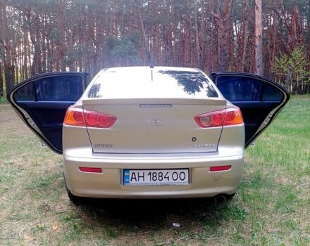 Бежевий Міцубісі Lancer, об'ємом двигуна 2 л та пробігом 164 тис. км за 6500 $, фото 11 на Automoto.ua