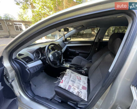 Бежевий Міцубісі Lancer, об'ємом двигуна 2 л та пробігом 189 тис. км за 6500 $, фото 12 на Automoto.ua