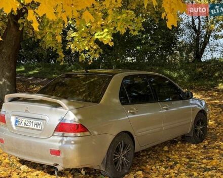 Бежевий Міцубісі Lancer, об'ємом двигуна 1.6 л та пробігом 200 тис. км за 3700 $, фото 14 на Automoto.ua