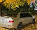 Бежевий Міцубісі Lancer, об'ємом двигуна 1.6 л та пробігом 200 тис. км за 3700 $, фото 14 на Automoto.ua