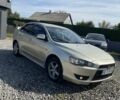 Бежевий Міцубісі Lancer, об'ємом двигуна 2 л та пробігом 253 тис. км за 5500 $, фото 2 на Automoto.ua