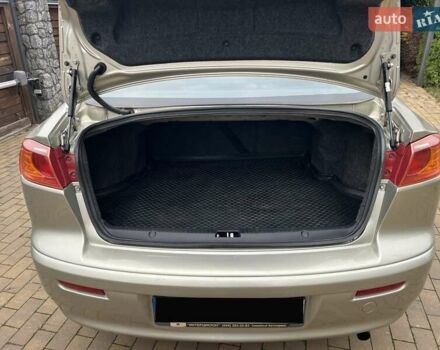 Бежевый Мицубиси Лансер, объемом двигателя 1.5 л и пробегом 230 тыс. км за 5950 $, фото 15 на Automoto.ua