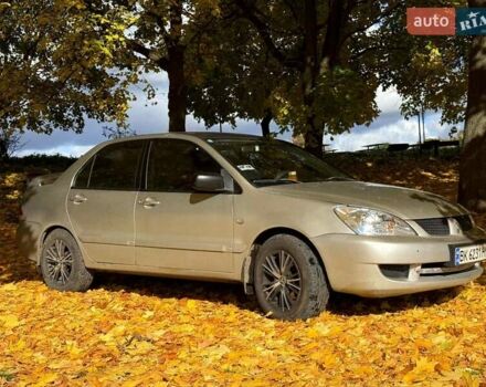 Бежевий Міцубісі Lancer, об'ємом двигуна 1.6 л та пробігом 200 тис. км за 3700 $, фото 12 на Automoto.ua