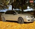 Бежевий Міцубісі Lancer, об'ємом двигуна 1.6 л та пробігом 200 тис. км за 3700 $, фото 12 на Automoto.ua