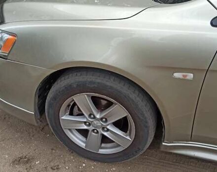 Бежевый Мицубиси Лансер, объемом двигателя 2 л и пробегом 235 тыс. км за 7200 $, фото 3 на Automoto.ua